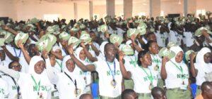 A cross-section of the National Youth Service Corps (NYSC) members administered three hearty cheers to the Acting Director, NYSC North Central Area Office 1, Mrs Adama Gladys during the swearing-in of the NYSC Niger State 2026 Batch B stream I orientation course at Kubwa orientation camp in Abuja on Thursday (9/7/26).