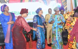 Minister of Women Affairs and Social Development, Hon. Imaan Suleiman-Ibrahim (3rd L); Director-General, Maryam Babangida National Center for Women Development (MBNCWD), Dr Adedayo Benjamins-Laniyi (2nd L); Keynote Speaker, Dr. Tsgye TItilayo (L); and other staff dancing during the celebration of the 1st Nigerian Pan-African Women’s Day organised by MBNCWD in Abuja on Friday (31/7/26).0268/THUR/JULY/30/2026/Deborah Bada/NAN
